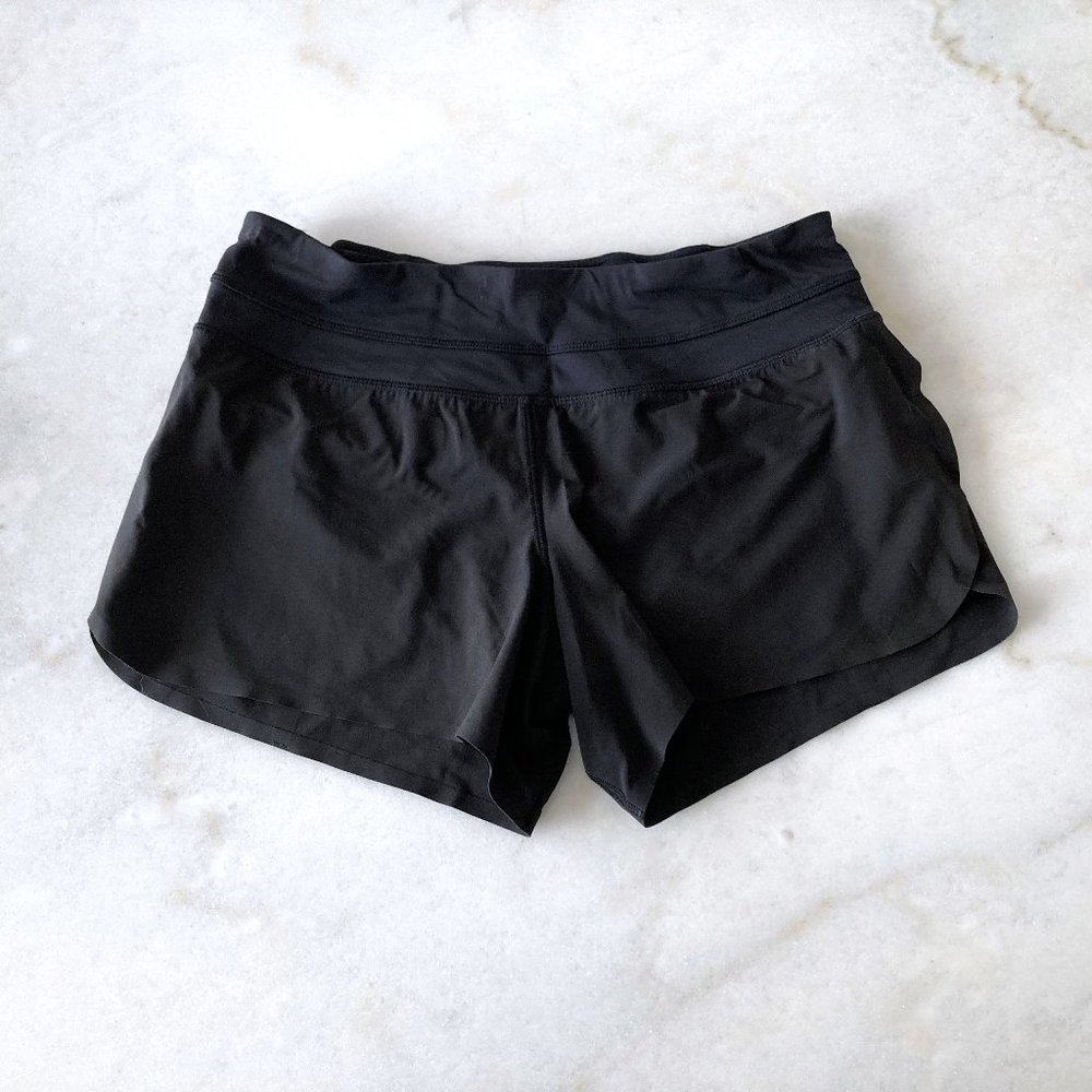 Lululemon black shorts with pockets, (size 6) drawstring waist